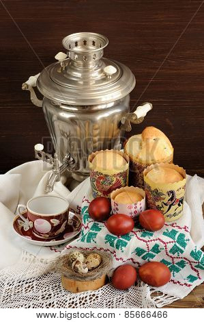 Kulichi, Traditional Russian Easter Cakes With Samovar, Dyed Eggs And Bird Nest On Handmade Rushnik