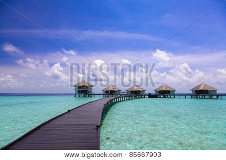 The path to the bungalow over the water