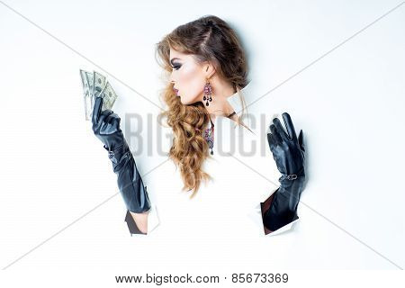Woman With Curly Hair Holding Money