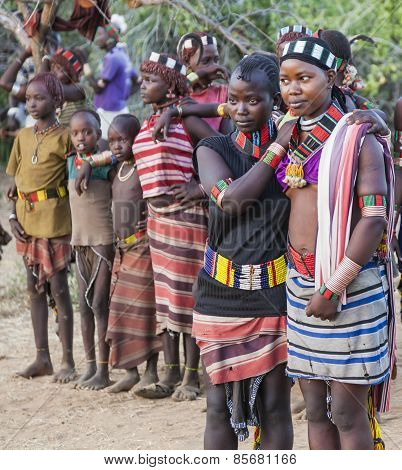 Boys And Girls At The Traditional Evangaty Ceremony. Turmi, Ethiopia