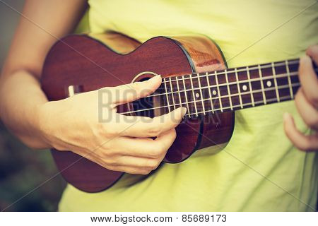Woman Playing Ukulele, Vintage Style.