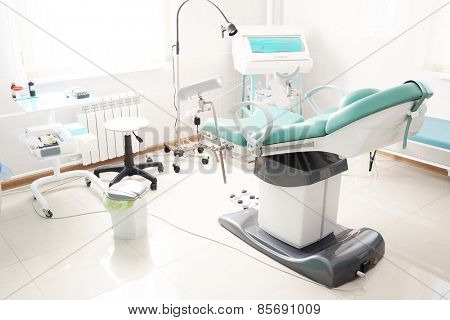 Gynecological chair in gynecological room