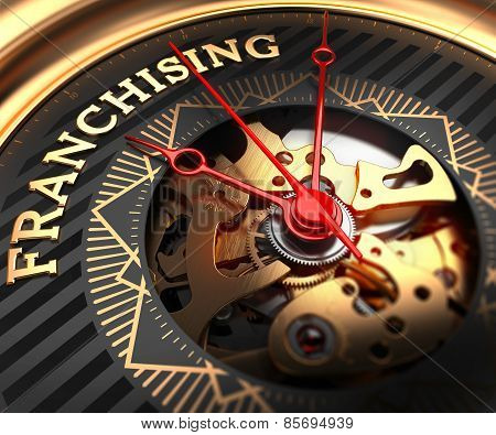 Franchising on Black-Golden Watch Face.