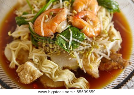 Lontong mie in Indonesian for its famous traditional food, or in English maybe spelled rice cake and noodle in vegetable soup