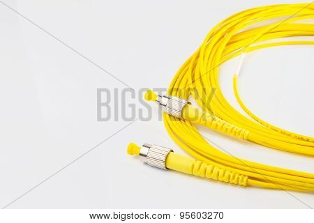 Close up of a fiber optic patchcord on white background