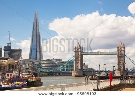 LONDON, UK - APRIL 30, 2015: Tower bridge and Shard of glass view from the River Thames