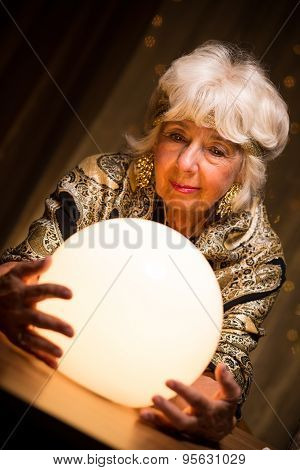 Seer Holding Crystal Ball