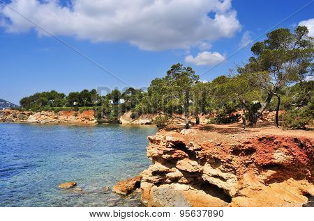 a view of the Mediterranean Sea and a calm scene in the northeastern coast of Ibiza Island, in the Balearic Islands, Spain