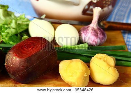 ingredients for the summer cold beet root soup and wooden country ladle