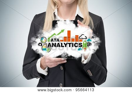 Blonde Business Woman Holds A Tablet With Cloud And Analytical Chart.