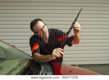 Mechanic Installing A New Wiper Blade