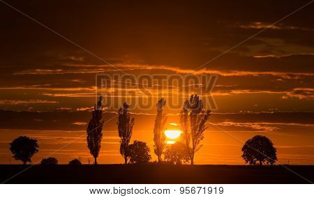 Beautiful Vibrant Sunset Over Field