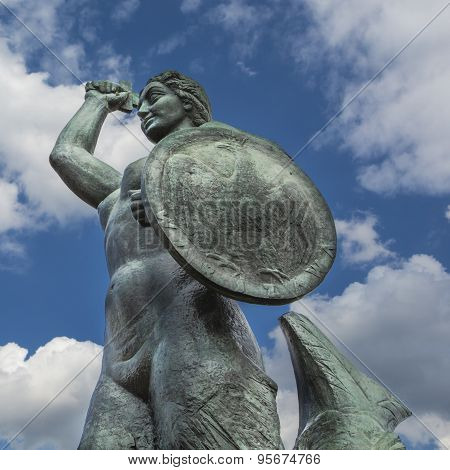The Warsaw Mermaid Called Syrenka On The Vistula River Bank In Warsaw, Poland