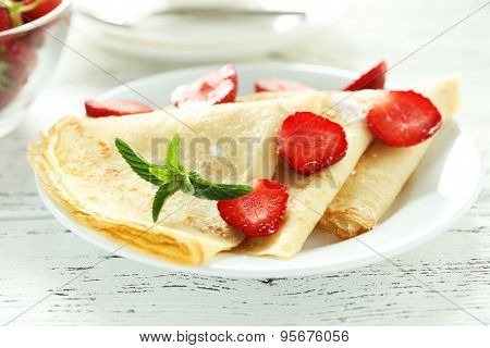 Tasty Pancakes With Strawberry On White Wooden Background