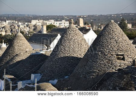 Beautiful aerial view of the traditional trulli houses with their conical roof in Alberobello, Apulia, Italy