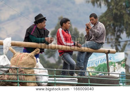 September 6 2016 Silvia Colombia: indigenous men standing on the top of a bus on market day