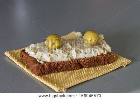 Vorschmack or forshmak is Jewish cuisine dish made of salty minced fish, egg, apple on wholegrain bread.