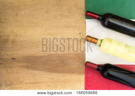 Italian Wine Bottles On Wooden Background