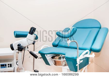 Colposcope And Gynecologicalchair In Medical Centre. Selective Focus
