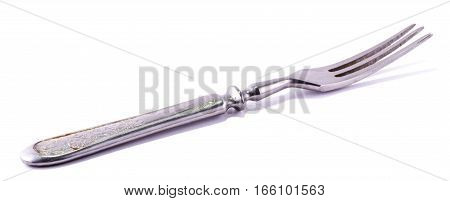 Iron fork on a white background. Isolated