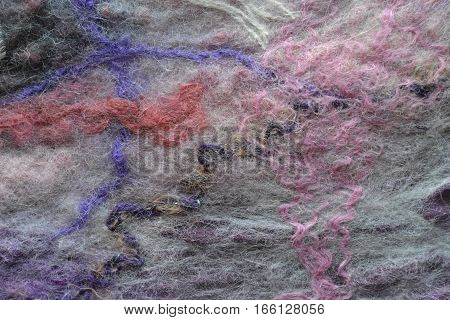 soft fluffy white wool interwoven colorful threads