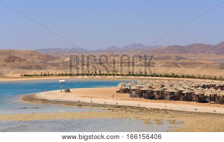 Beach Sun Parasol And Blue Sky, Holliday In Egypt