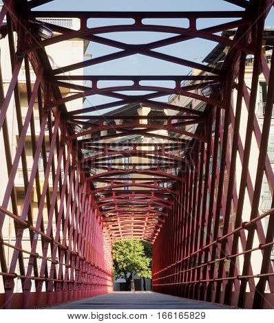 Girona (Gerona Catalunya Spain): red bridge over the Onyant river