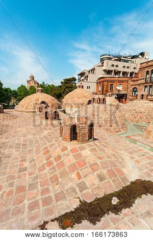 Abanotubani - ancient district of Tbilisi, Georgia, known for its sulfuric baths. The roof with dome of red brick of steam rooms.
