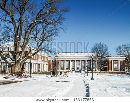 Charlottesville, USA - December 3, 2009: Alderman library and campus grounds covered in snow during winter at University of Virginia