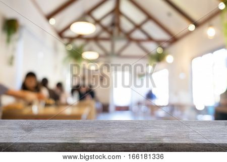 product display montage of Empty wooden table and blurred resturant or coffee shop background