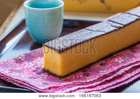 Castella - traditional Japanese sponge cake and hot tea