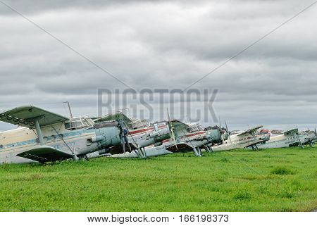 Tyumen, Russia - August 23, 2008: On visit at UTair airshow in Plehanovo heliport. AN-2 airplanes on parking lot