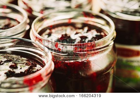 Close Up View Of Jars With Sweet Tasty Yummy Red Jam