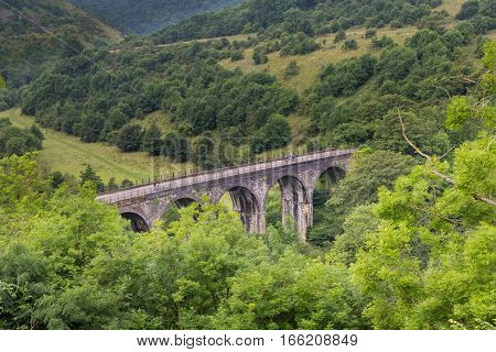 Viewed from Monsal Head the Monsal Trail passes over Headstone Viaduct