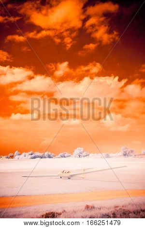 a toned infrared shot of landscape with a glider. this shot was taken using a modified canon eos 40d and is also post-processed.