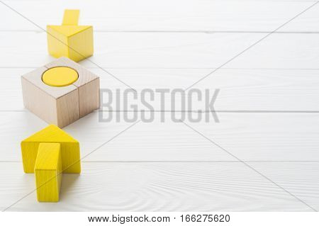 Symbol of goal and objective. Two wooden arrows converge towards the center target. Arrows pointing to the object. Business concept. The concept of the goal the implementation of the planned success.
