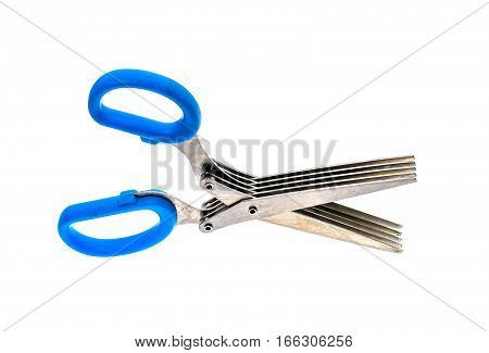 Herb and spice scissors with comb on a white background. Special scissors with multiple blades and blue handles isolated on white background.