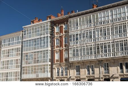 Burgos (Castilla y Leon Spain): facade of historic buildings with balconies and verandas