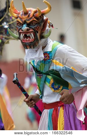 May 25 La Villa de los Santos Panama: men wearing colourful traditional mask and clothing during Corpus Cristi celebration