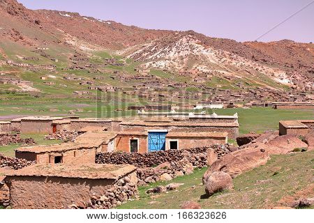 MOROCCO: Sheepfold close to Sirwa peak in the Atlas mountains with Berber architecture