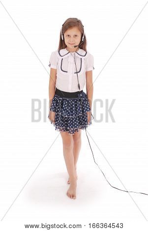 Happy young girl listening to music full length isolated on white