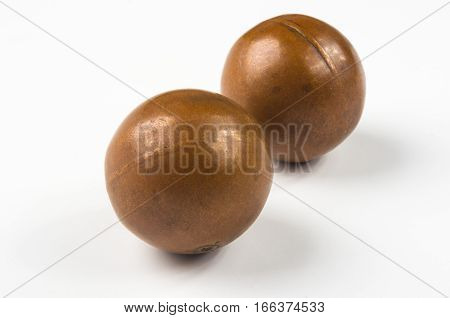 pair of copper Chinese singing balls Baoding of health for hands on white background