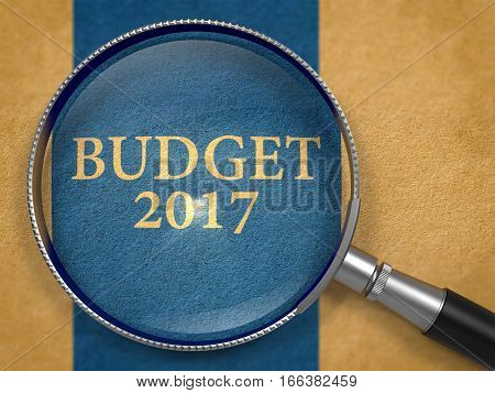 Budget 2017 through Lens on Old Paper with Dark Blue Vertical Line Background. 3D Render.