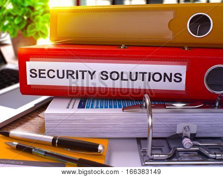Security Solutions - Red Office Folder on Background of Working Table with Stationery and Laptop. Security Solutions Business Concept on Blurred Background. Security Solutions Toned Image. 3D.