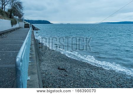 A view of a seawall walkway in West Seatle Washington.