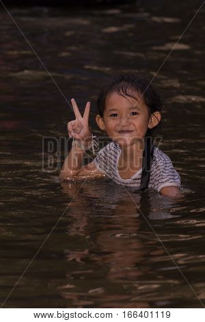 asia girl in river , thai children