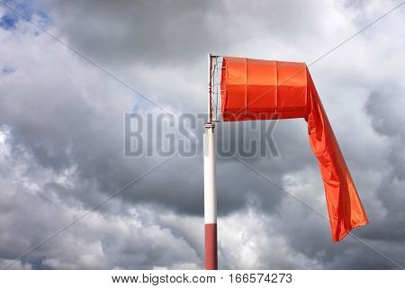 Wind sock of equipment check the wind blow direction in day time and no wind blow on overcast sky cloudy.