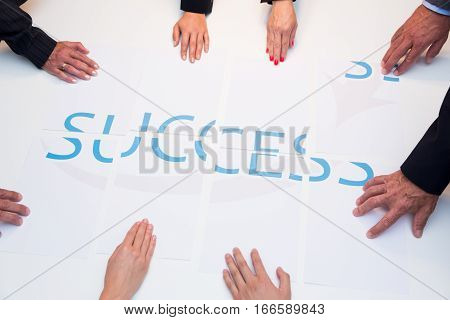 concept shot of a  business team contributing to create the bigger picture. unfortunately, one of the team members screws things up.