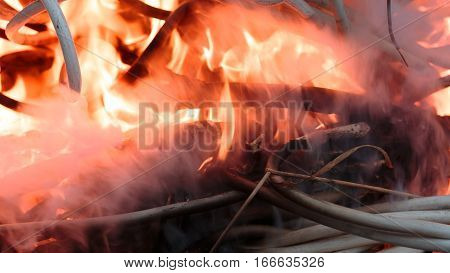 wires on fire. Firing winding insulation of electrical wiring in the fire close-up