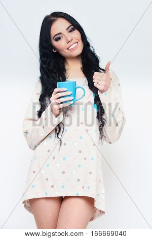 Smiling Pretty Sexy Girl With Coffee Cup Isolated On White